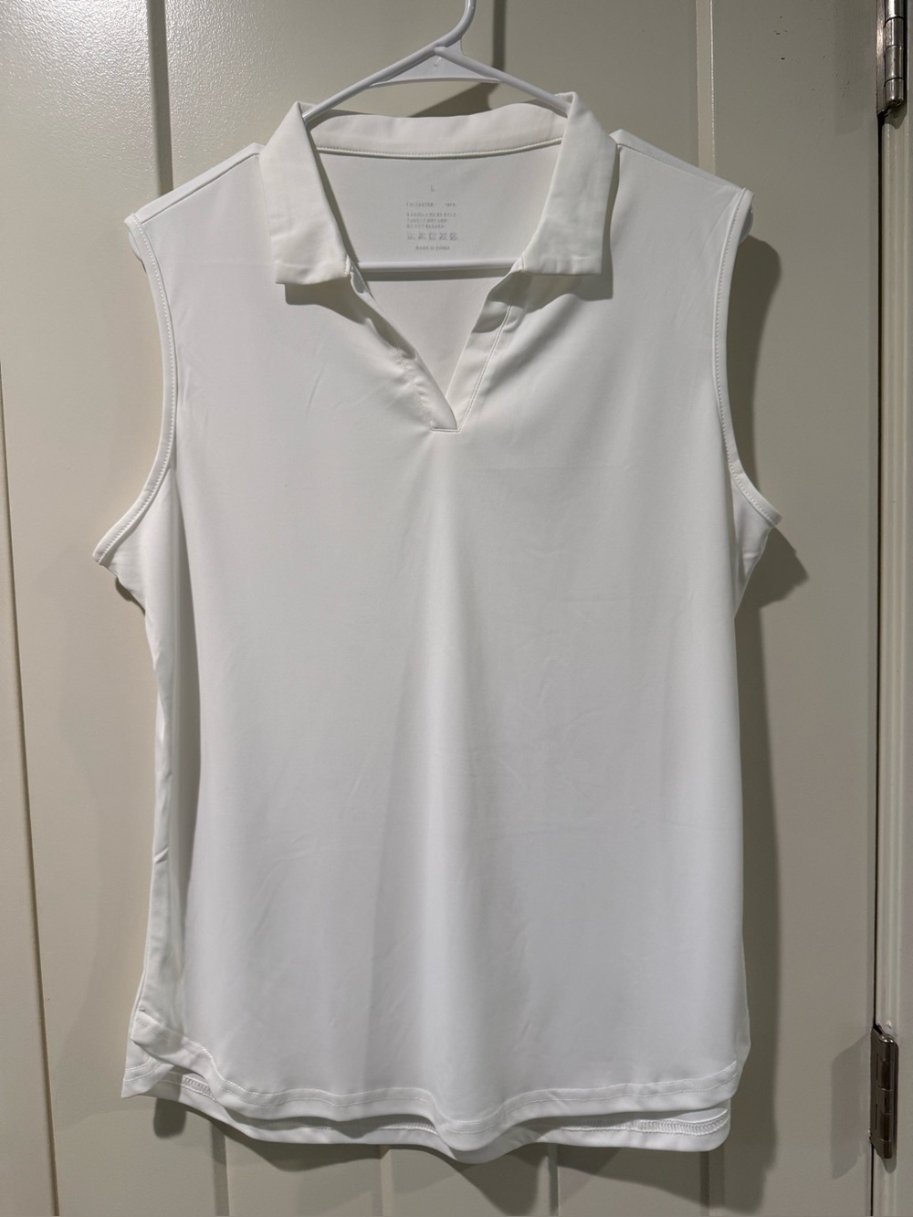 NWOT Women’s White Sleeveless Golf Polo Large